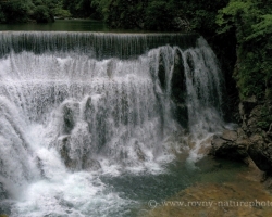 Place where wild stream Radovna is stopped by weir