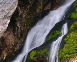 One of the many breathtaking waterfalls berúcich Julian Alps